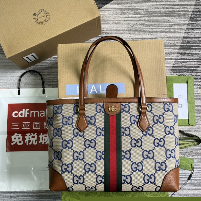 G*u*i shopping bags